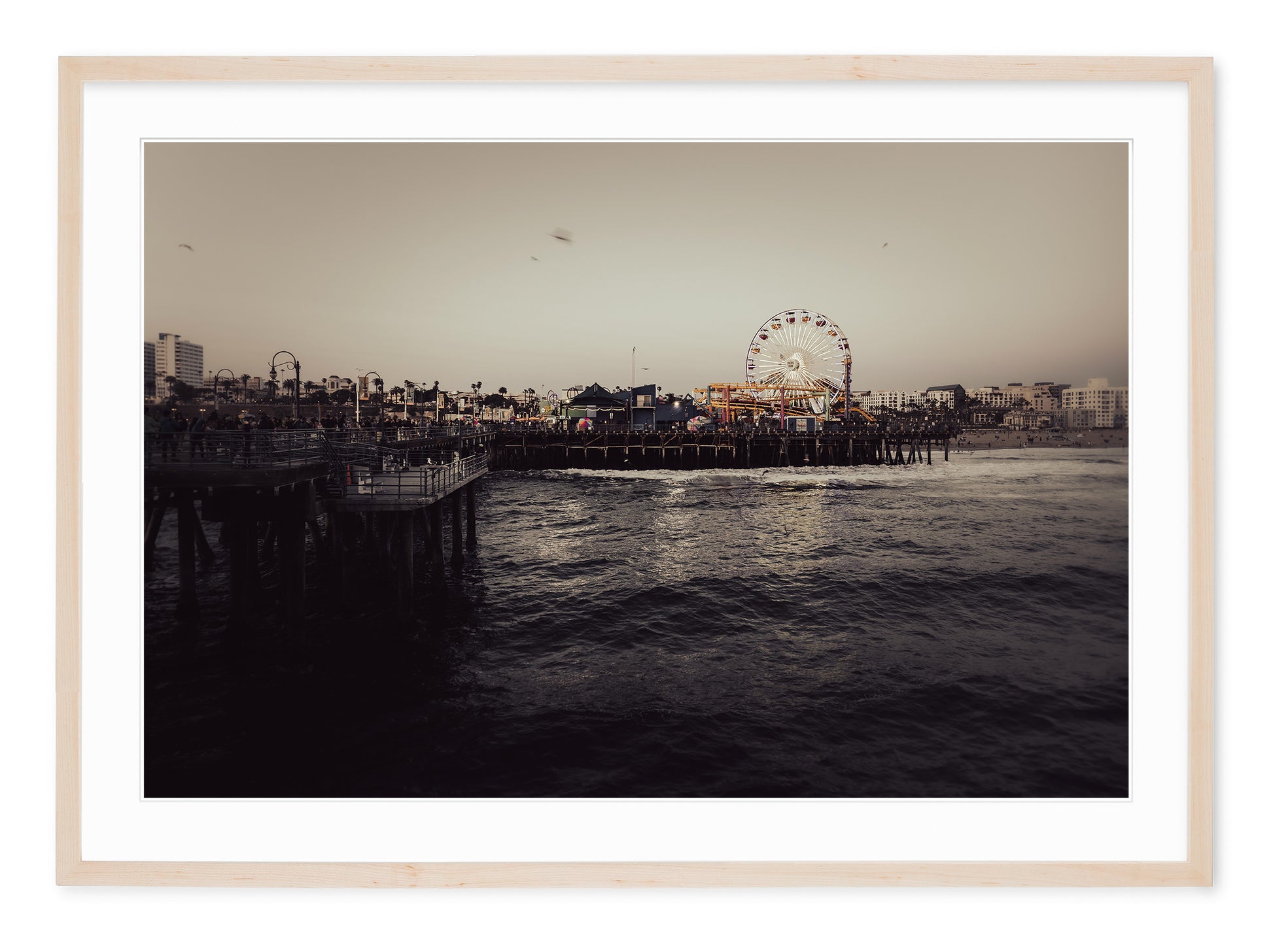 neutral tone fine art image of the santa monica pier at sunset