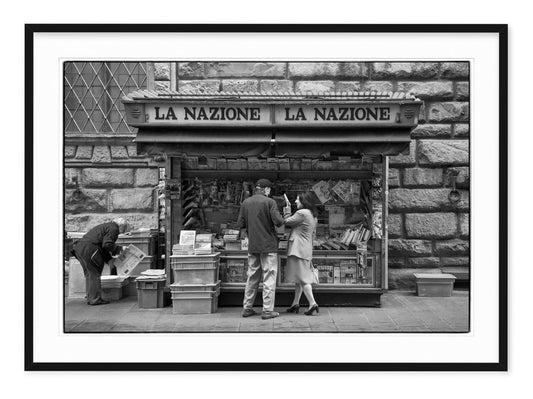 black & white travel photo of newsstand in Rome, italy