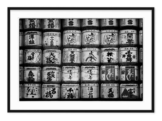 black and white fine art image of sake barrels in tokyo japan